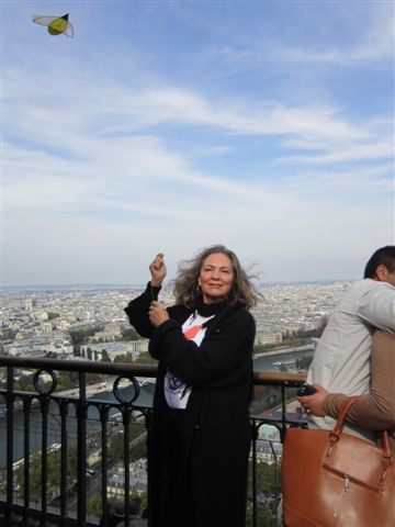 Jane Parker-Ambrose flying a Kite
                                  at the Eiffel Tower